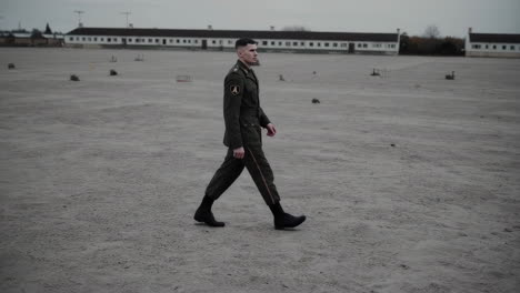 soldier walking in a desert-like area