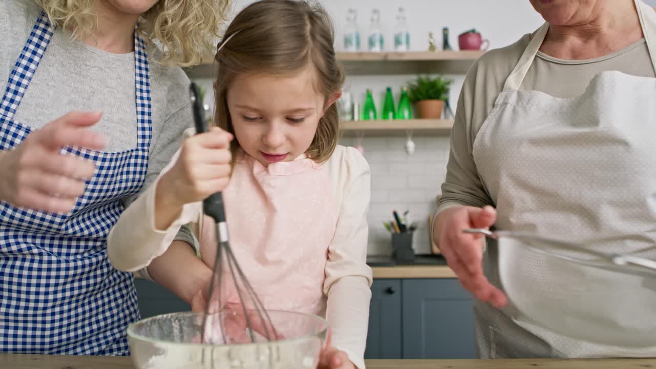 Video of girl mixing ingredients in a bowl for Easter cake