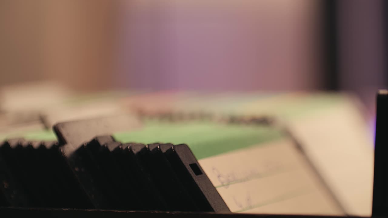 Using diskette for old computer. Music recorder, playing retro computer games. Vintage device for office, obsolete technology. . High quality 4k footage