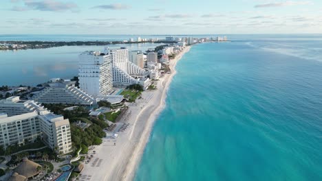 beautiful aerial shot of cancun coastline with hotels and turquoise waters, playa delfines