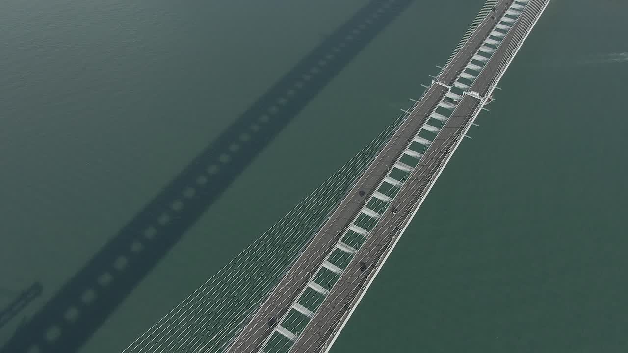 Traffic on Hong Kong Stonecutters bridge, Topd own aerial view.