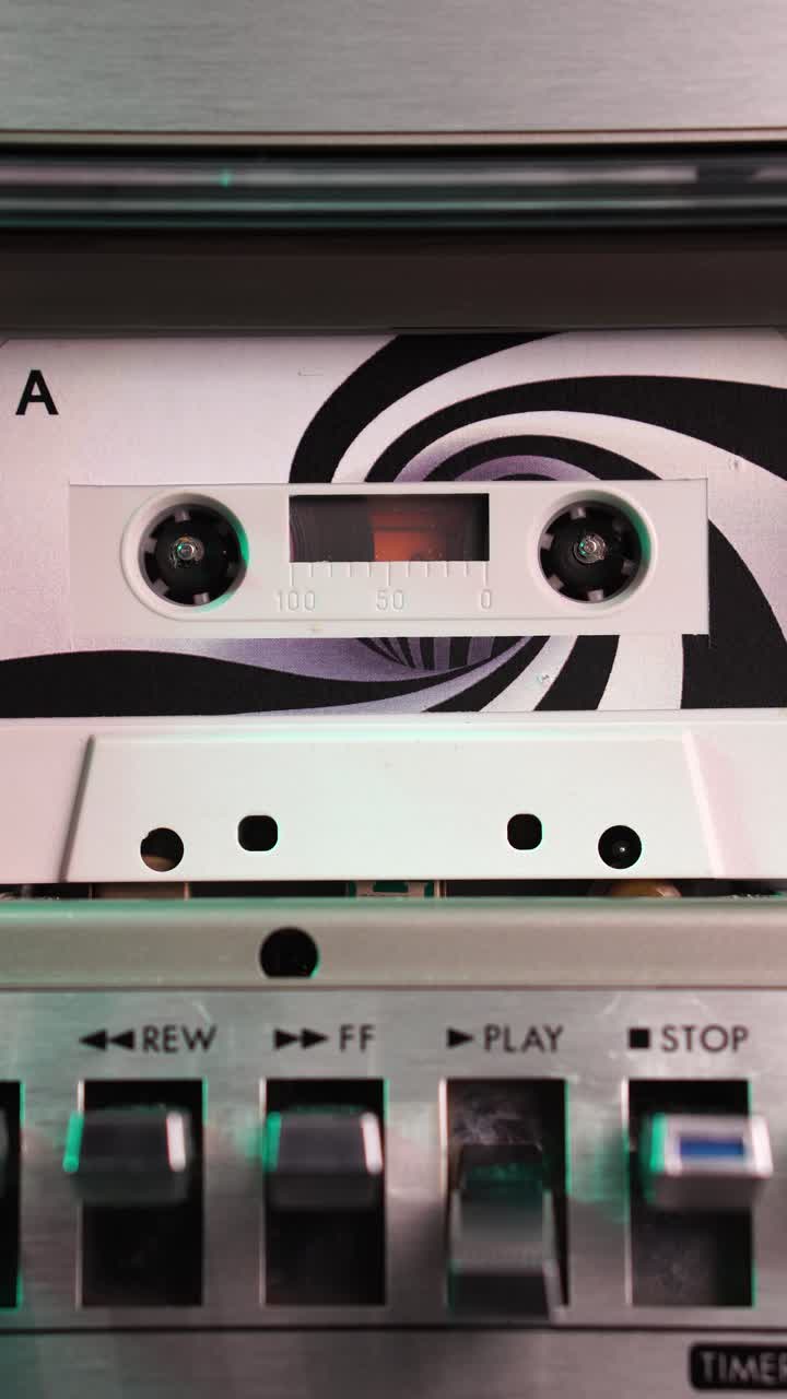 Close-up of a Vintage Cassette Tape in a Tape Deck