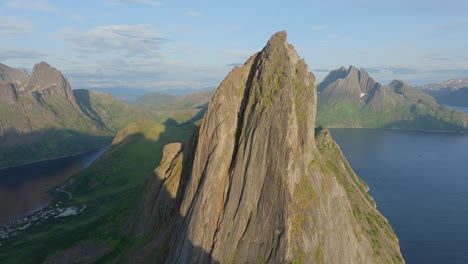 aerial view of segla mountain peak on a sunny day from hesten hiking area in senja, noway