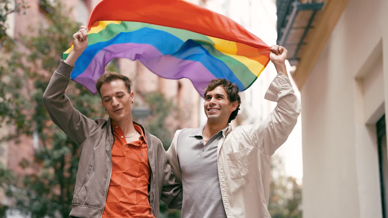 Couple Celebrating Pride with Rainbow Flag
