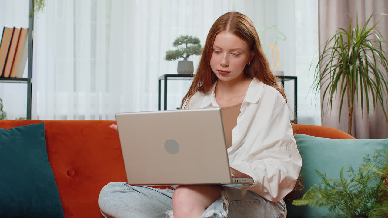 Teen child girl use laptop surprised by bad news fortune loss fail lottery results exam results