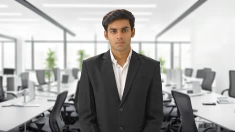 angry indian manager staring at the employees