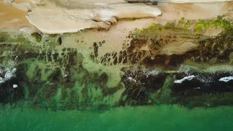 green-emerald-glass-crystal-water-low-depth-sea-sand-beach-rock-formation-marine-adventure-in-aerial-drone-shot-summer-tropical-climate-travel-to-enjoy-holidays-marine-tourism-gulf-natural-landscape