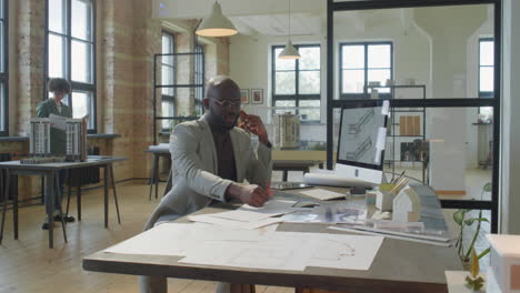 architects working and collaborating in a modern design studio