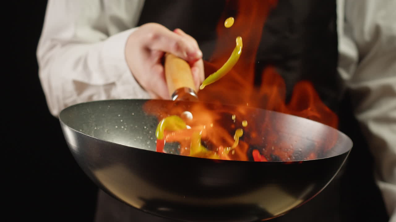 Chef Stir-Frying in a Wok