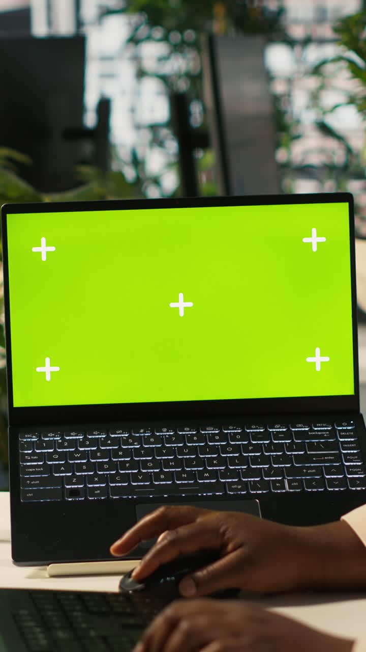 Vertical video Mockup tablet and laptop in office used by employee working