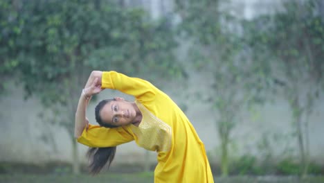 indian girl doing body stretch exercise