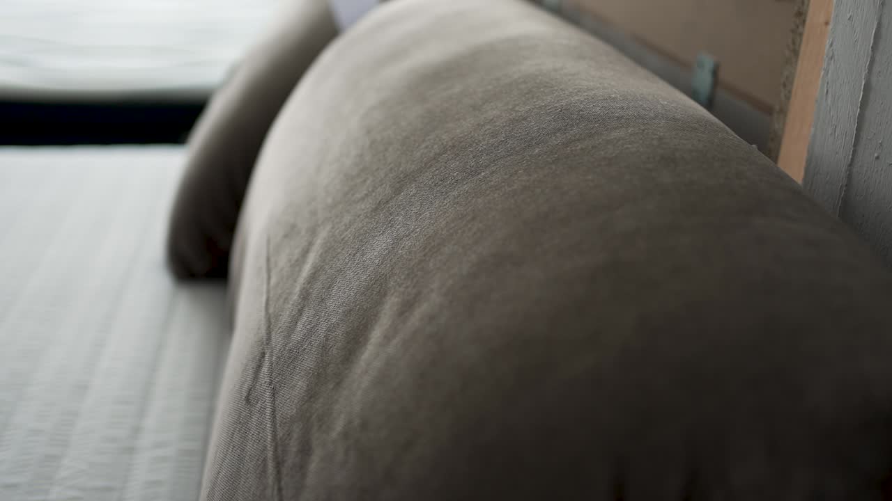 Explore creative ideas for arranging a modern living room with a neutral-toned sofa. Discover tips on texture and comfort for an inviting atmosphere