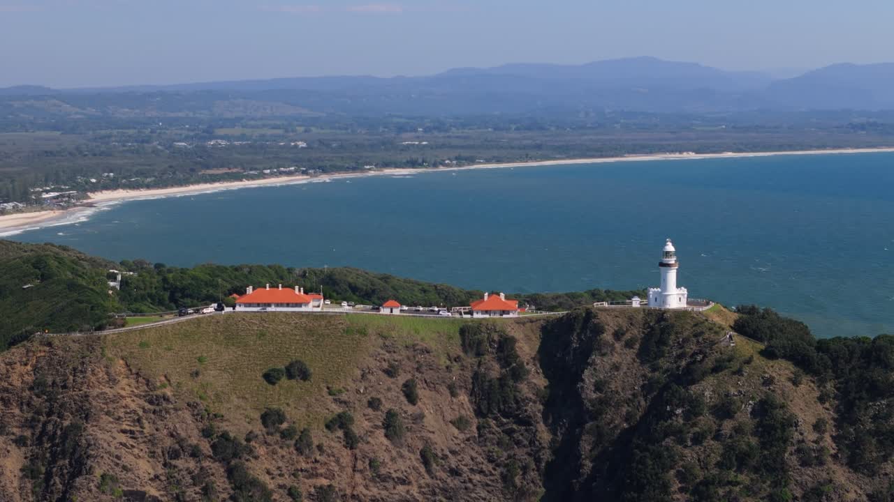 Drone panning around Byron Bay lighthouse on summers day