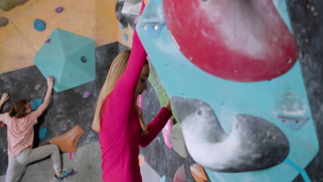 teenagers climbing indoor