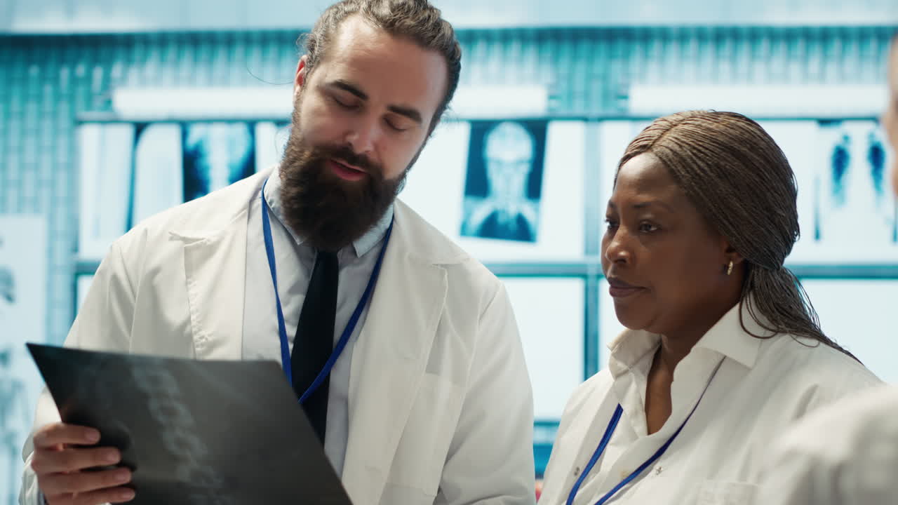 Medical Team Discussing X-ray Results