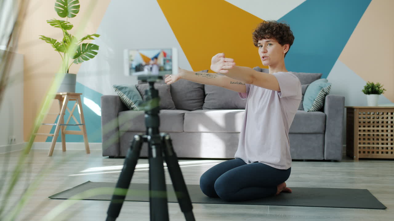 Woman Leading Online Yoga Class