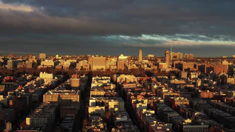 Drone-turn-and-flyover-of-Harlem-towards-Morningside-Heights-neighborhoods-in-Manhattan,-New-York-City