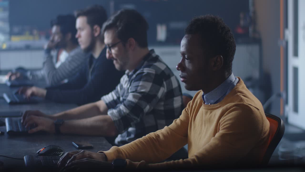 Team of programmers working in an office