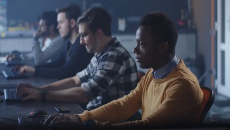 team of programmers working in an office