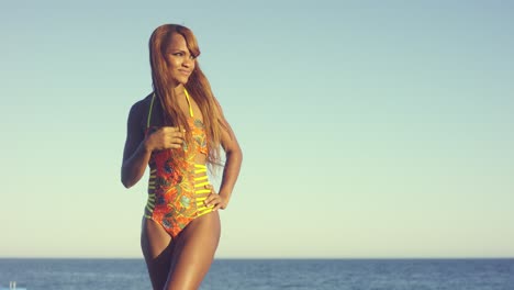 beautiful young african woman in a swimsuit