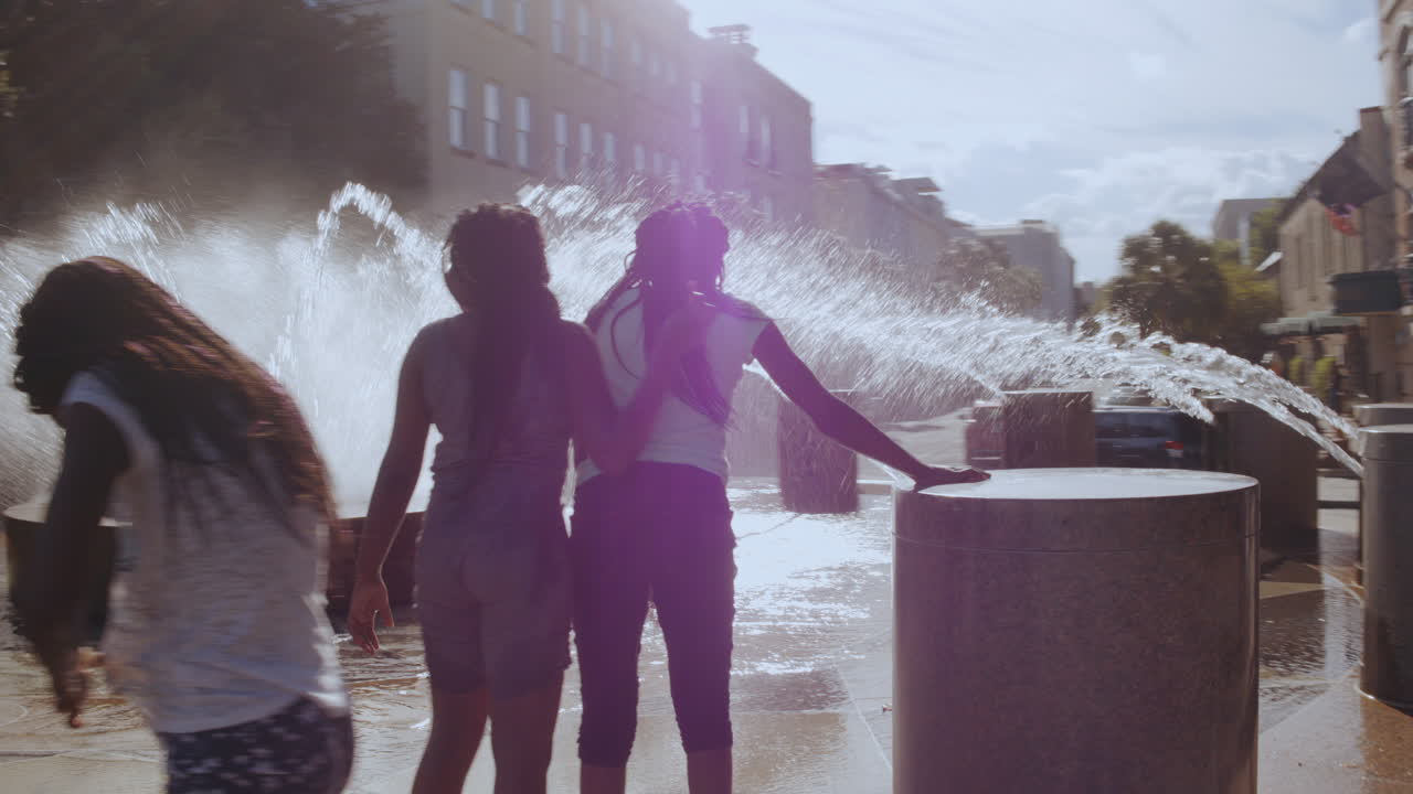 Diverse Kids Playing at Waterfront Park Fountain, Day, Moving