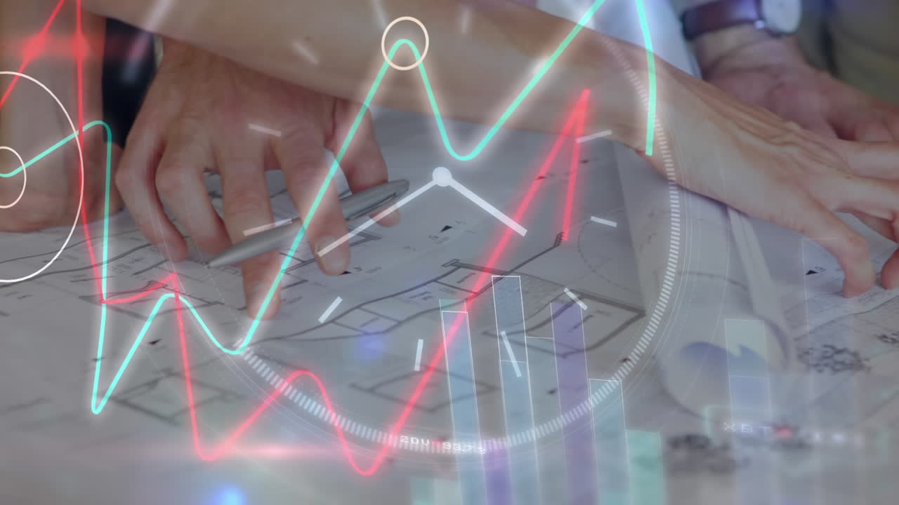 건축가 그룹이 청사진을 검토하고 있습니다.