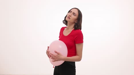 Woman Holding Pink Balloon