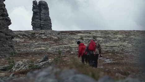 hikers in a rocky mountain landscape