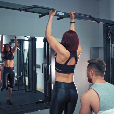 couple in gym working out