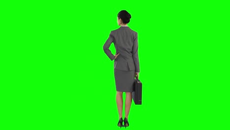 Business-woman-walking,-standing-and-looking-around-while-waiting