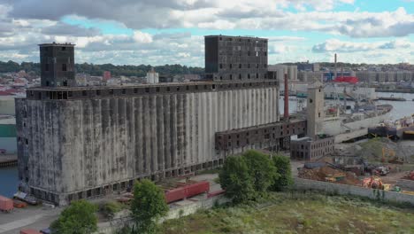 aerial flight toward massive abandoned grain terminal in brooklyn new york city