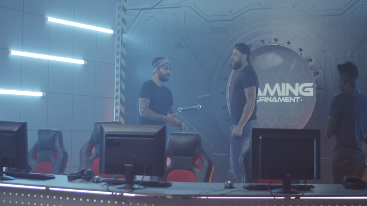 Gaming Team Sitting down at Computers Medium Closeup of a Team Sitting down at their Computers at a Gaming Tournament