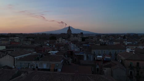 sunset over catania with mount etna in the background, aerial view