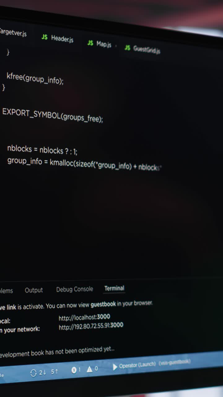 Vertical Video Young IT engineer typing code on computer and running script