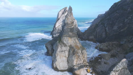 modern aerial drone capture of praia da ursa, portugal, near cabo da roca. early morning, bright and sunny.