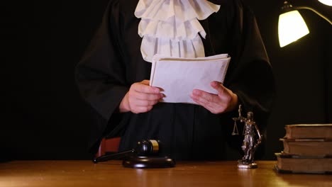 a judge prepares for court with key documents, highlighting the importance of justice in the courtroom
