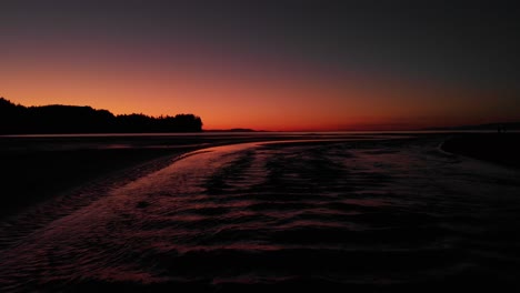 aerial pan back of port townsend washington during a beautiful sunset