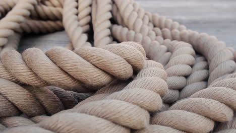 a rope covered rolled in coil in daytime in the port