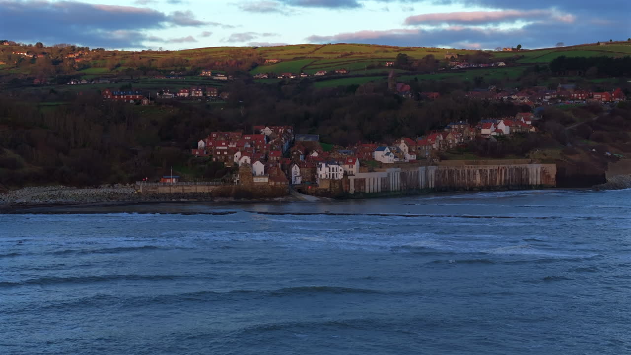 Establishing Aerial Shot of Robin Hood's Bay at Sunrise Yorkshire UK