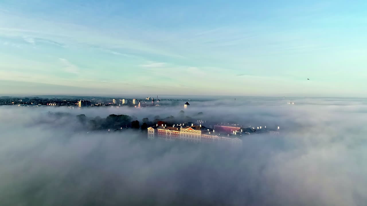 Jelgava castle in the misty haze of early Premium Stock Video Footage