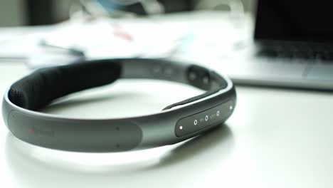 gray wearable device on a desk