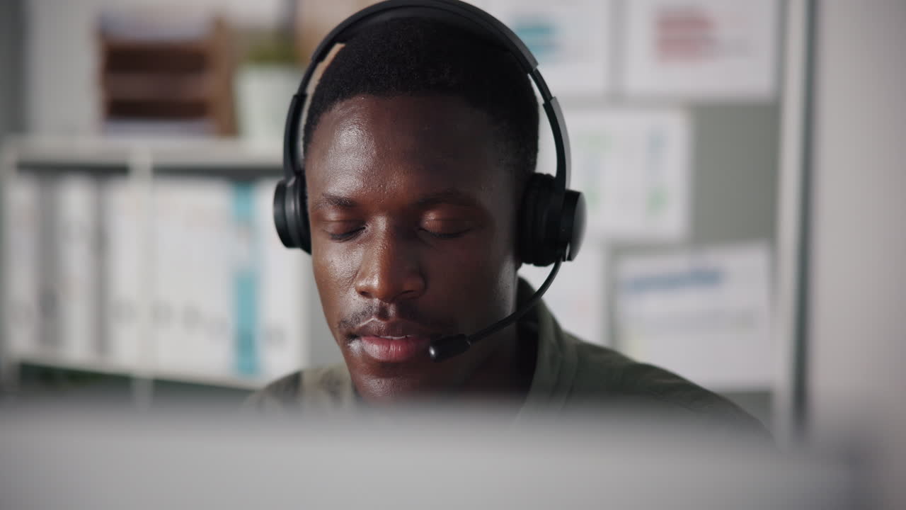 Man wearing headset in office