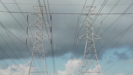 Time-lapse-of-clouds-moving-behind-high-tension-wires-and-power-lines-3