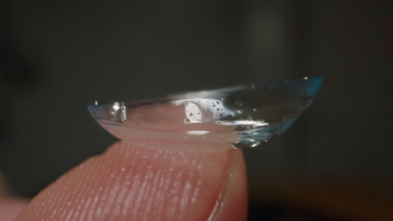 Contact Lens on Finger