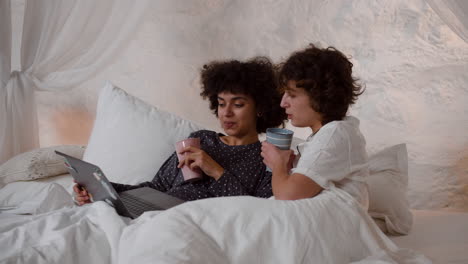 couple watching movie on laptop