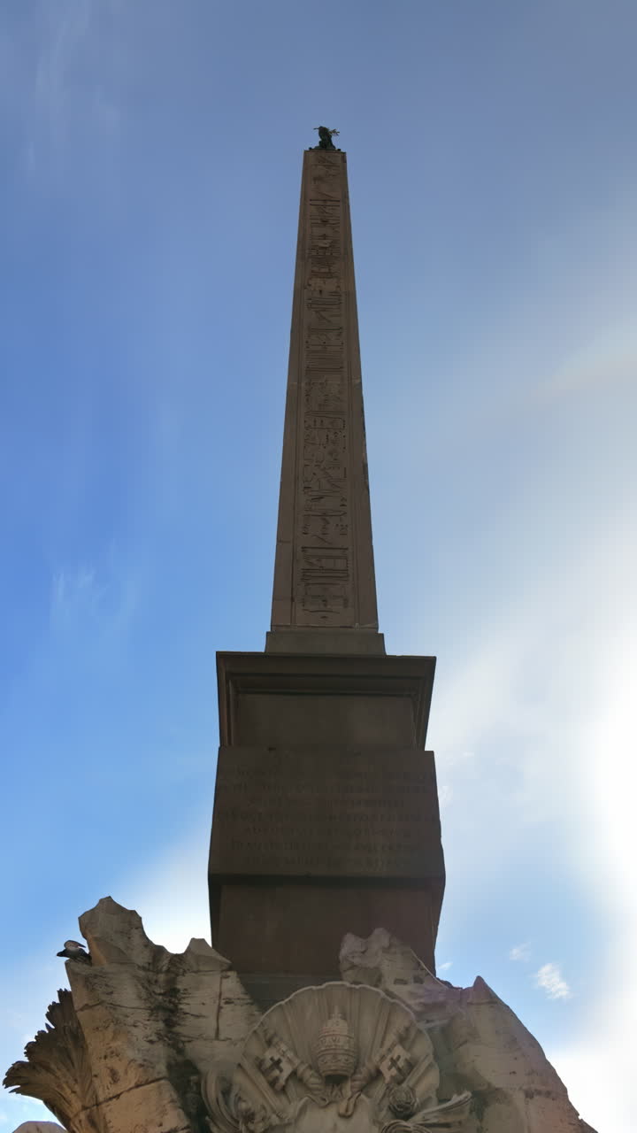 Rome, Italy - February 16, 2024: Fountain of the Four Rivers in the Navona Square. Vertical