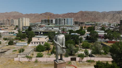 lenin statue in panjakent, tajikistan - aerial pullback