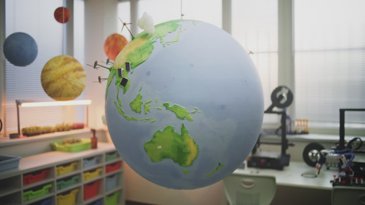 Modern STEM Classroom Rotating Earth Model with Miniature 3D Models of Wind Turbines and Solar
