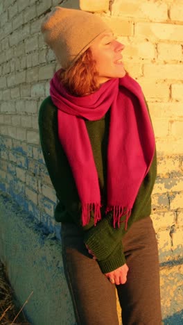 woman contemplating in a winter sunrise
