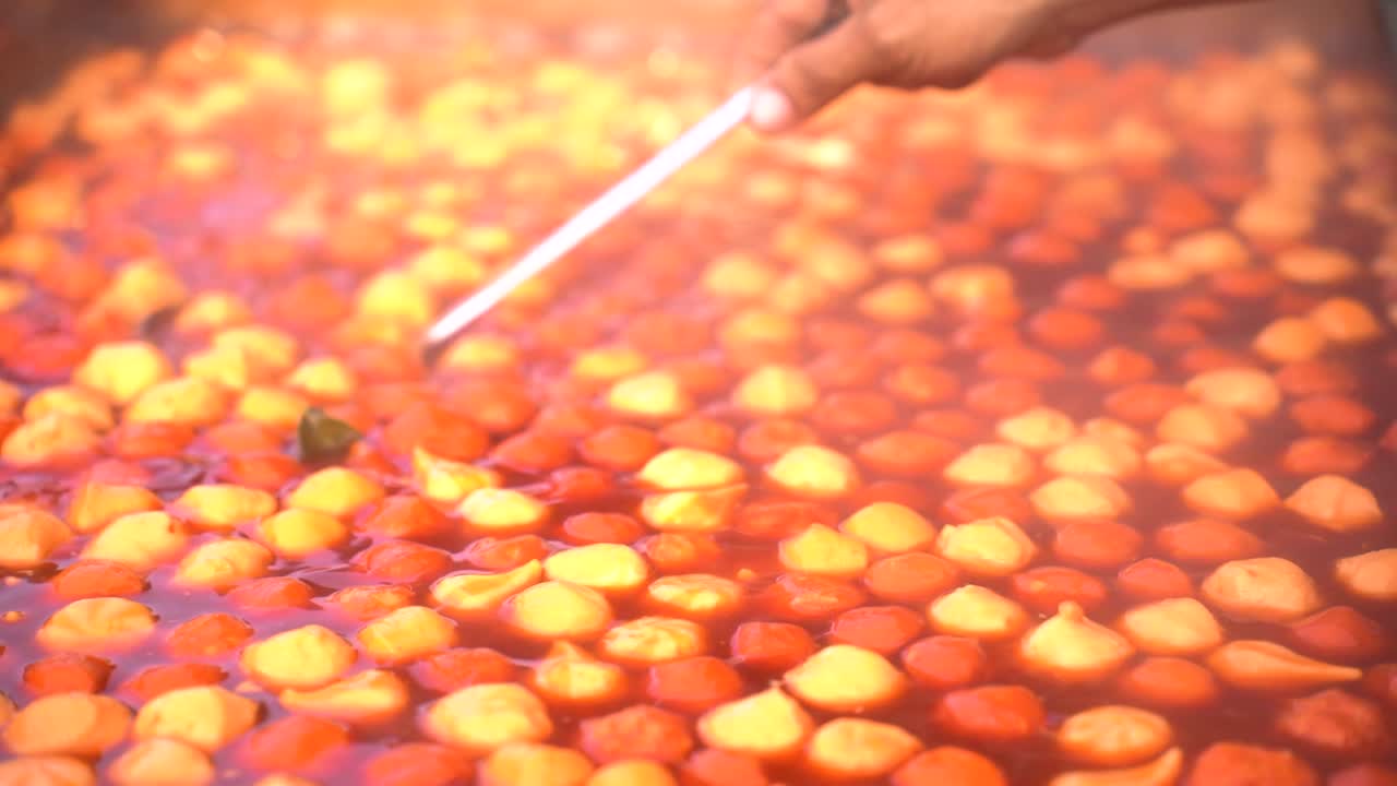 close up of stir-fried extra spicy meatballs, street food at the jogokariyan mosque ramadhan market